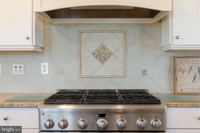 24537 Wave Maker Dr, Millsboro, DE 19966 - kitchen with white cabinetry, light countertops, premium range hood, and backsplash