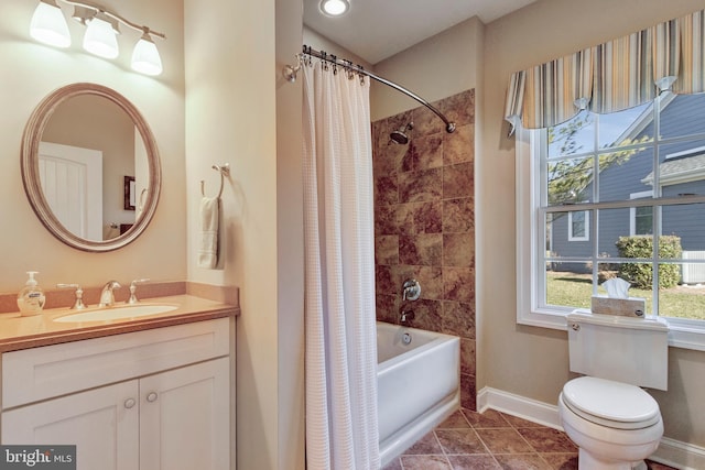 24537 Wave Maker Dr, Millsboro, DE 19966 - full bathroom featuring vanity, baseboards, shower / bath combo, tile patterned floors, and toilet
