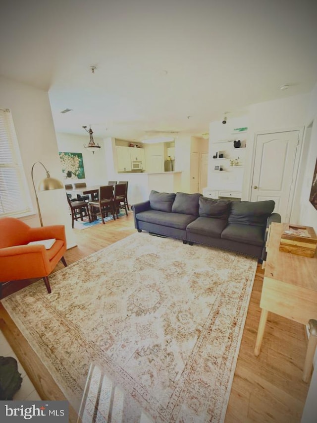 living area with light wood-style flooring