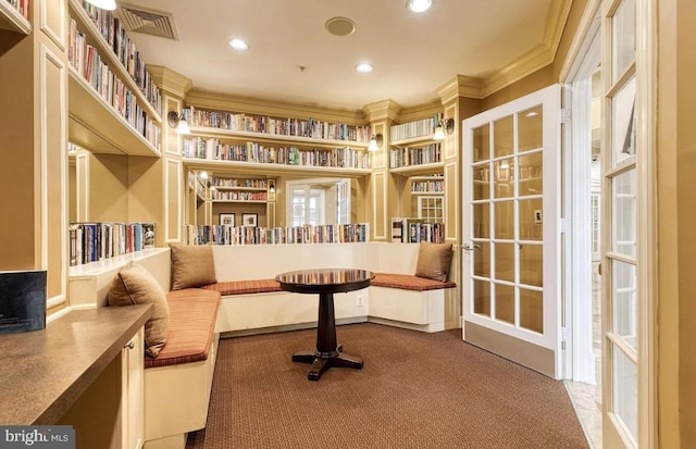 sitting room featuring recessed lighting, visible vents, carpet floors, and crown molding