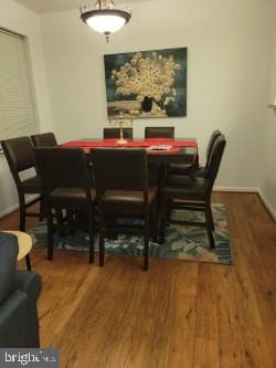 dining room with wood finished floors