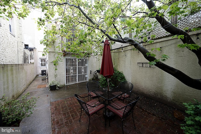 view of patio with fence