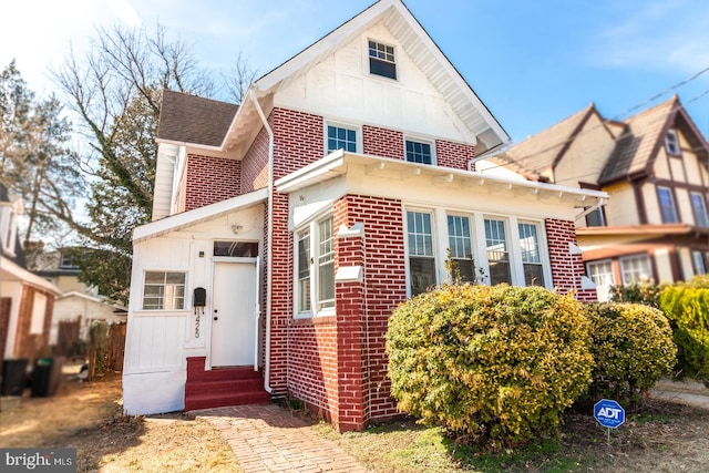 exterior space featuring brick siding and entry steps