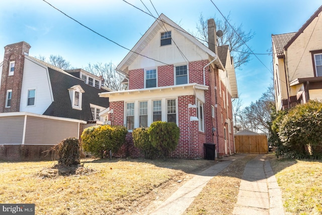 view of front of house with brick siding