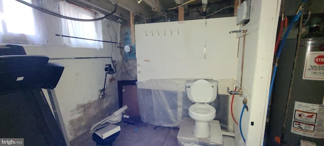 utility room with water heater