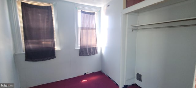 unfurnished bedroom featuring a closet