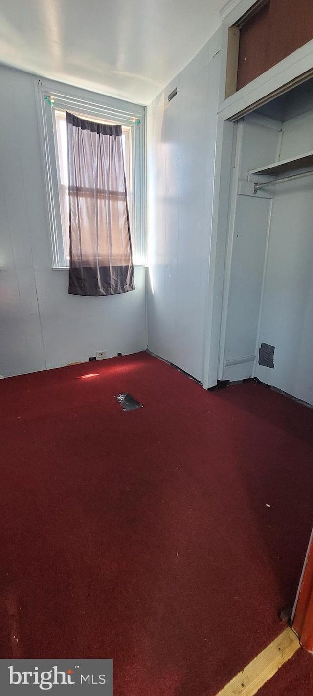 unfurnished bedroom featuring carpet floors