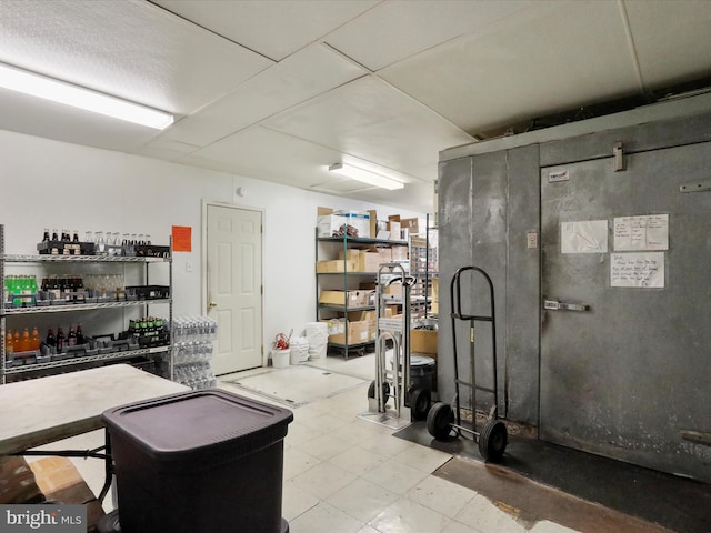 basement featuring tile patterned floors