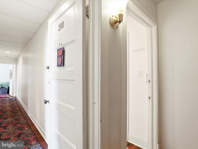 hall with dark wood finished floors