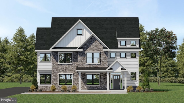 view of front facade with a front lawn, board and batten siding, and stone siding