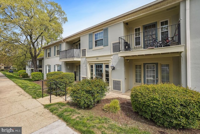 8358 Dunham Ct Unit 626, Springfield, VA 22152 - view of front facade featuring a balcony and stucco siding