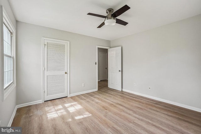 8358 Dunham Ct Unit 626, Springfield, VA 22152 - unfurnished bedroom featuring light wood finished floors, a ceiling fan, baseboards, and a closet