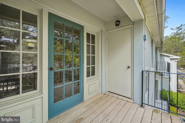 8358 Dunham Ct Unit 626, Springfield, VA 22152 - view of exterior entry featuring stucco siding and a porch