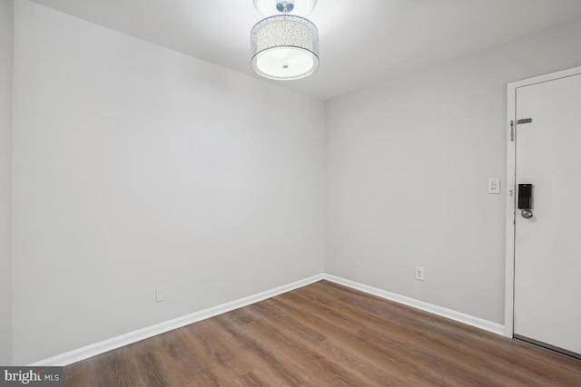 8358 Dunham Ct Unit 626, Springfield, VA 22152 - unfurnished room featuring wood finished floors and baseboards
