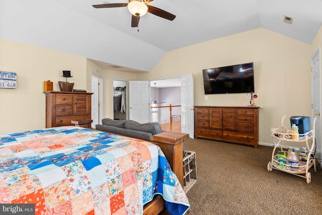 bedroom featuring lofted ceiling, carpet, visible vents, and ceiling fan