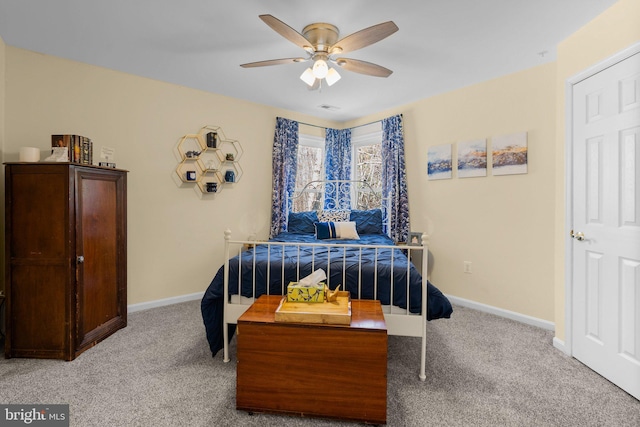 bedroom with visible vents, carpet flooring, a ceiling fan, and baseboards