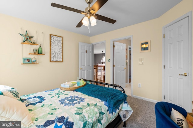 bedroom with baseboards, carpet floors, and ceiling fan