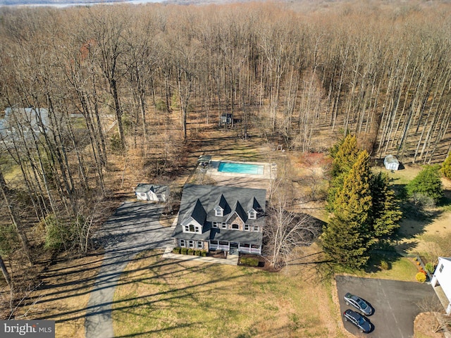 aerial view with a wooded view