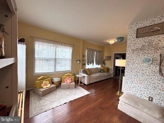 living area with wood finished floors