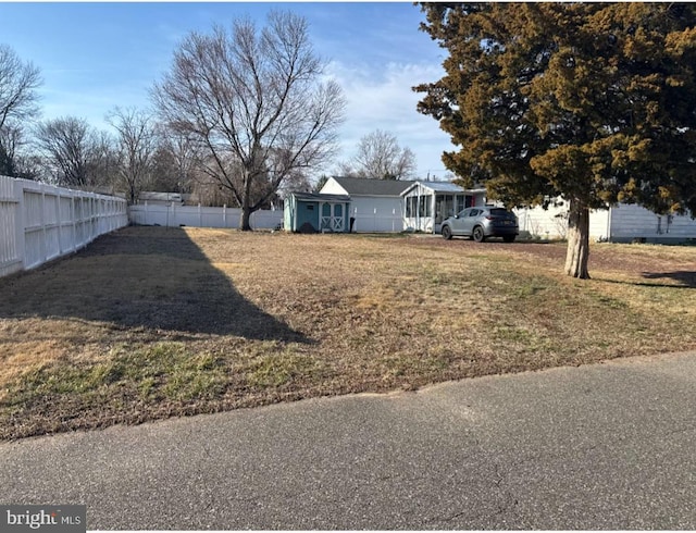 view of yard featuring fence