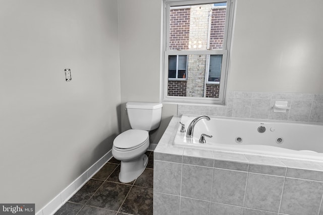 full bathroom with tile patterned floors, baseboards, toilet, and a tub with jets