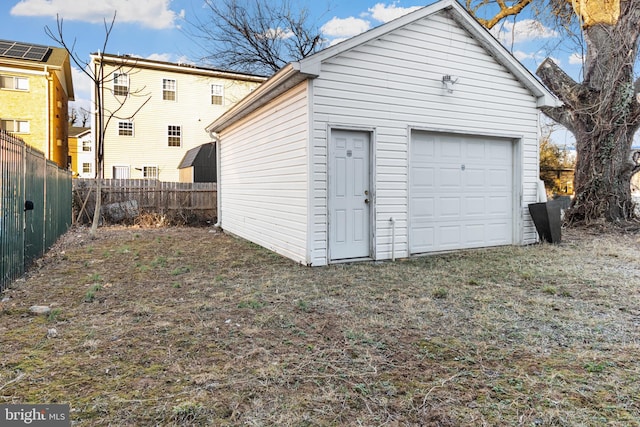 garage featuring fence