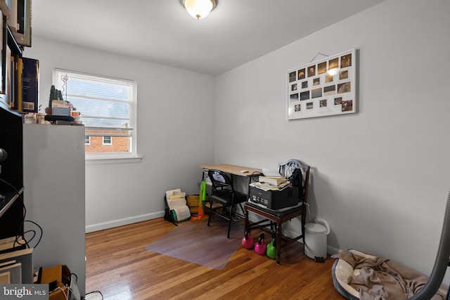 office featuring wood finished floors and baseboards