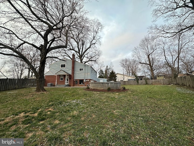 view of yard featuring a fenced backyard