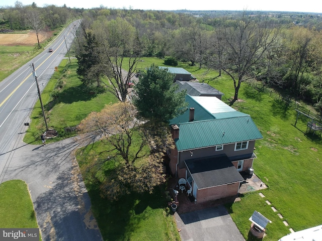 bird's eye view with a forest view