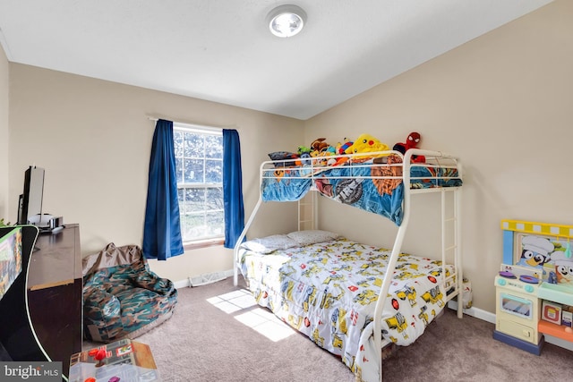 carpeted bedroom with baseboards