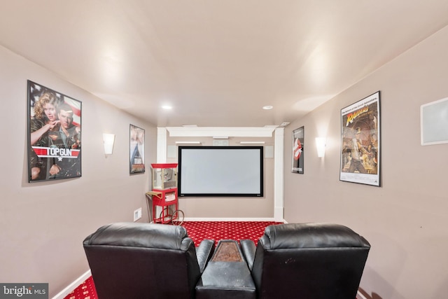 carpeted cinema with recessed lighting and baseboards