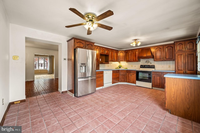 kitchen featuring stainless steel fridge with ice dispenser, light tile patterned floors, electric stove, white dishwasher, and custom exhaust hood