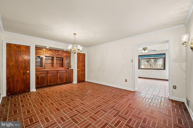 unfurnished dining area featuring visible vents, baseboards, a notable chandelier, and crown molding