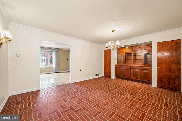 unfurnished dining area featuring visible vents, baseboards, crown molding, and an inviting chandelier