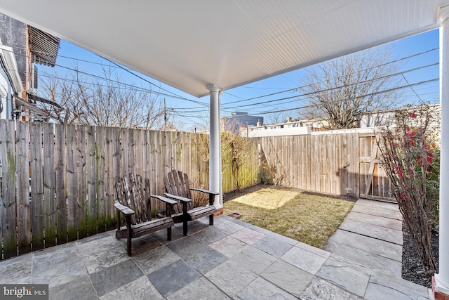 view of patio featuring a fenced backyard