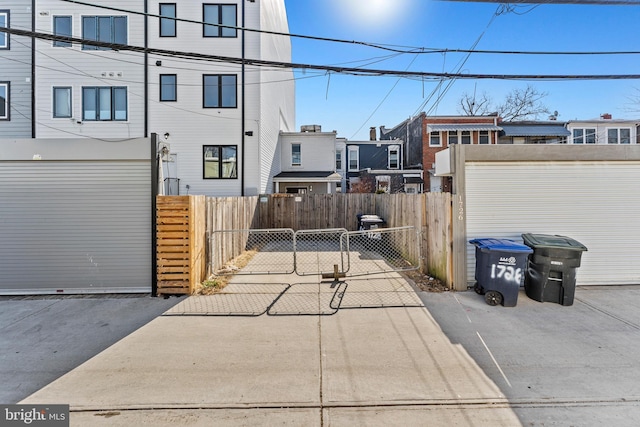 exterior space with a gate and fence