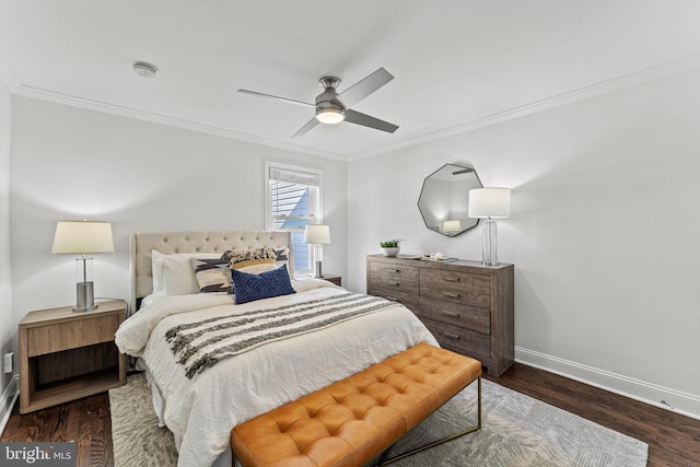 bedroom featuring crown molding, wood finished floors, baseboards, and ceiling fan