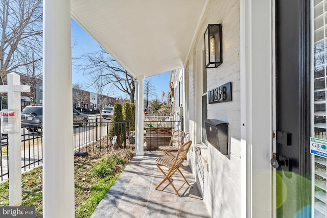 balcony featuring covered porch