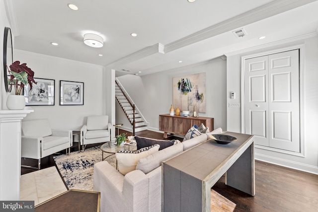 living room featuring baseboards, dark wood finished floors, recessed lighting, ornamental molding, and stairs