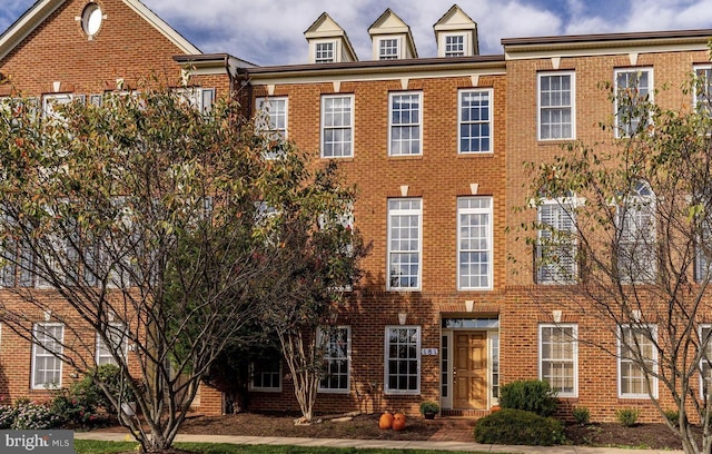 multi unit property featuring brick siding