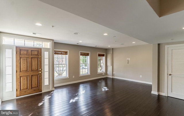 entrance foyer with visible vents, recessed lighting, baseboards, and dark wood-style flooring