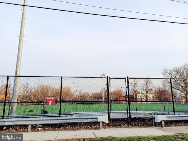 view of community featuring a gate and fence