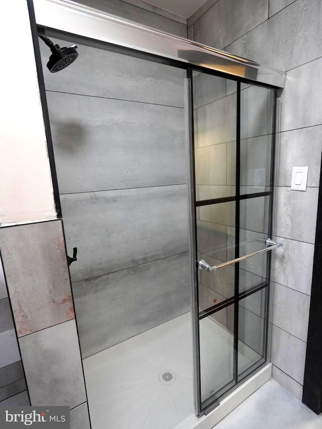 bathroom featuring a stall shower