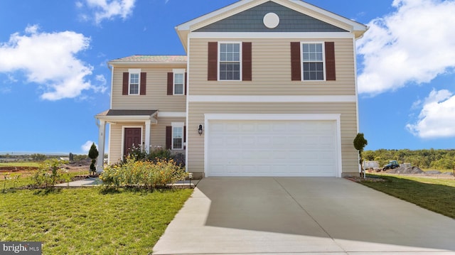 traditional-style house with a front lawn, a garage, and driveway