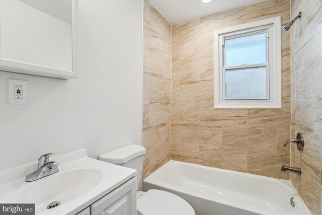 bathroom with vanity, toilet, and shower / bathtub combination