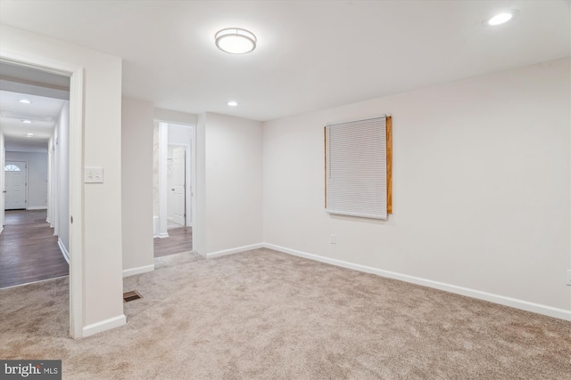 interior space with visible vents, recessed lighting, baseboards, and carpet floors