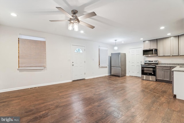 kitchen with recessed lighting, appliances with stainless steel finishes, dark wood-style floors, and ceiling fan