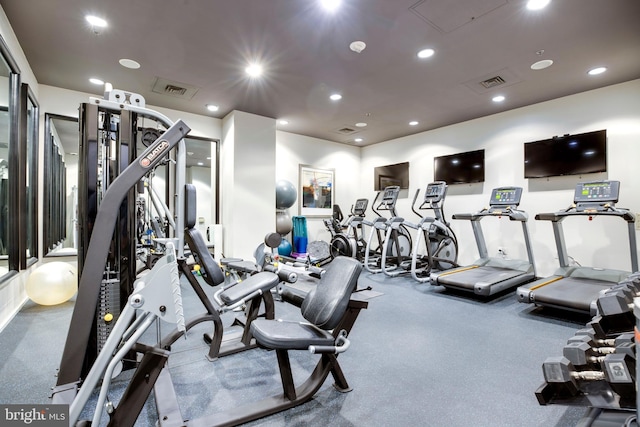 exercise room with recessed lighting and visible vents