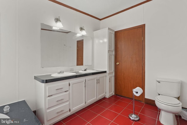 full bath featuring double vanity, tile patterned floors, toilet, and a sink