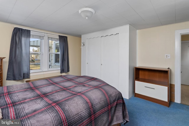 bedroom featuring carpet flooring